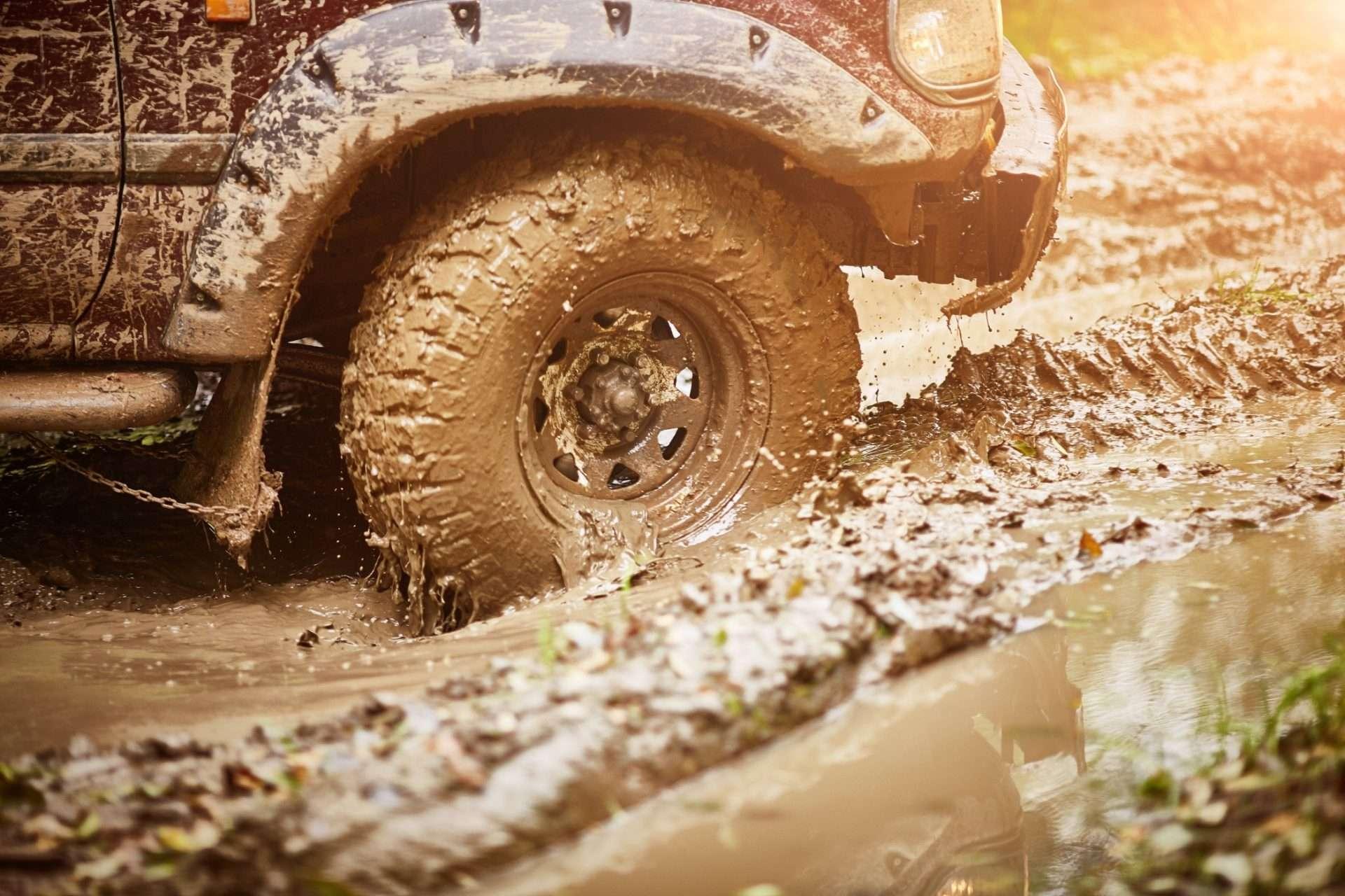 moving-dirty-off-road-car-tire-in-mud-close-up_t20_LlQ8po-1920x1280.jpg